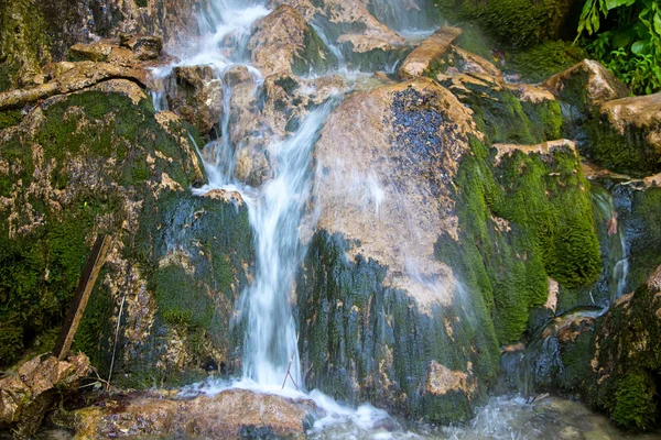 Photo of waterfall in green rocks — Stock Photo, Image