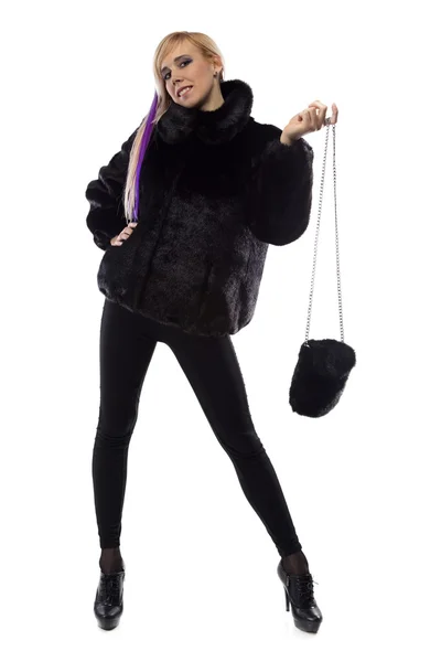 Фото женщины с меховой сумкой, руки вверх — стоковое фото