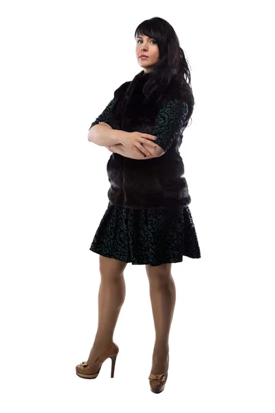 Photo of pudgy woman in fur jacket, arms crossed — Stock Photo, Image