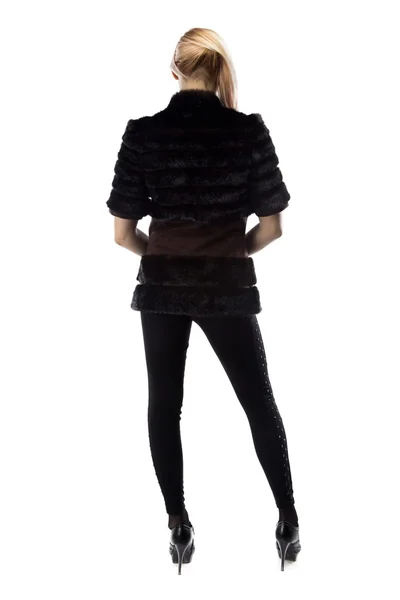Foto de loira de jaqueta preta, de costas — Fotografia de Stock