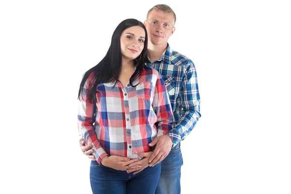 Image of man and pregnant woman in plaid shirts — Stock Photo, Image