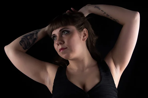 Photo of fat woman with tattoo on hand — Stock Photo, Image