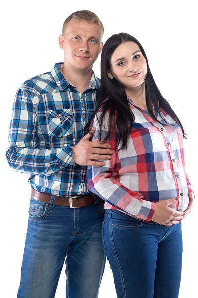 Photo of man and pregnant woman in plaid shirts — Stock Photo, Image