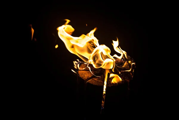 Photo burning piece of wood — Stock Photo, Image