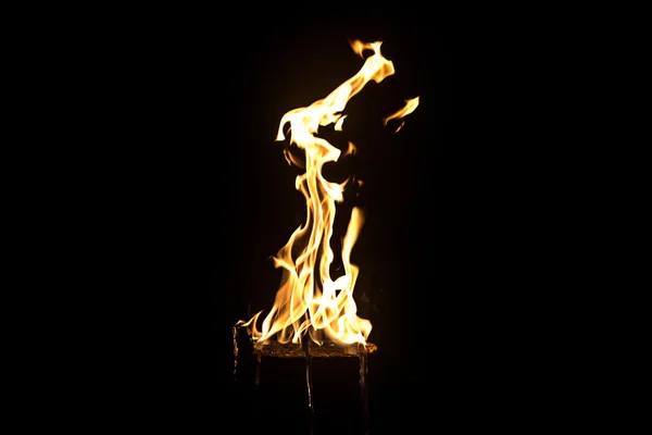 Photo of light yellow flame by night — Stock Photo, Image