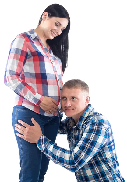 Imagem do homem ouvindo bebê, mulher grávida — Fotografia de Stock