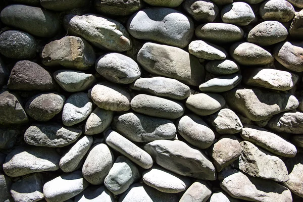 Foto de piedras grises al sol — Foto de Stock