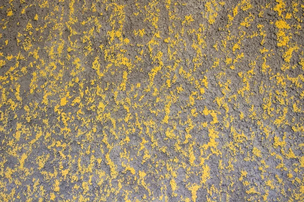 Photo wall with uneven yellow surface — Stock Photo, Image