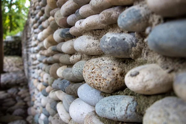 Wall paved with colourful stone — Stock Photo, Image