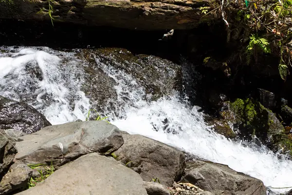 Photo of waterfall among stones — Stock Photo, Image