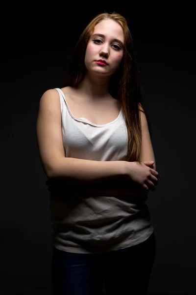 Photo of pudgy girl with arms crossed — Stock Photo, Image