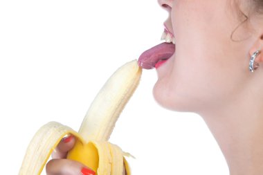 Bir muz yemek kadın fotoğrafı