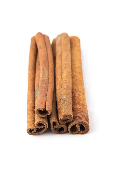 Photo of brown stacked cinnamon sticks — Stock Photo, Image