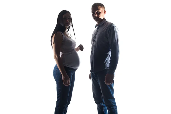Foto těhotná žena a muž ve stínu — Stock fotografie