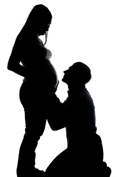Silhouette del marito guardando moglie incinta — Foto Stock