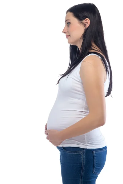 Młoda kobieta w ciąży w profilu — Zdjęcie stockowe