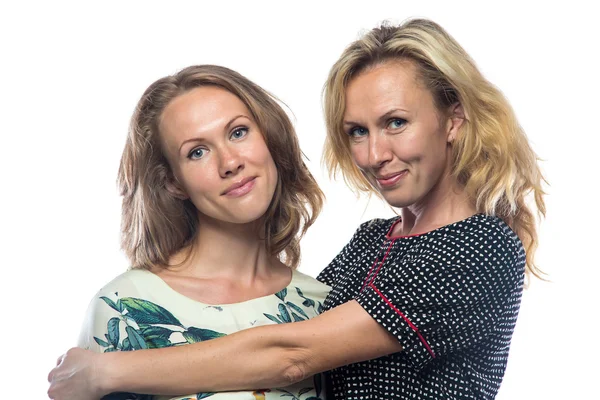 Dos mujeres felices sobre fondo blanco — Foto de Stock