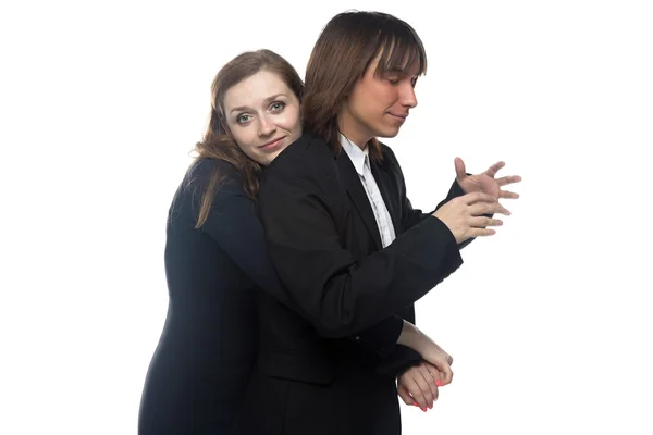 Woman holding man in black jacket — Stock Photo, Image
