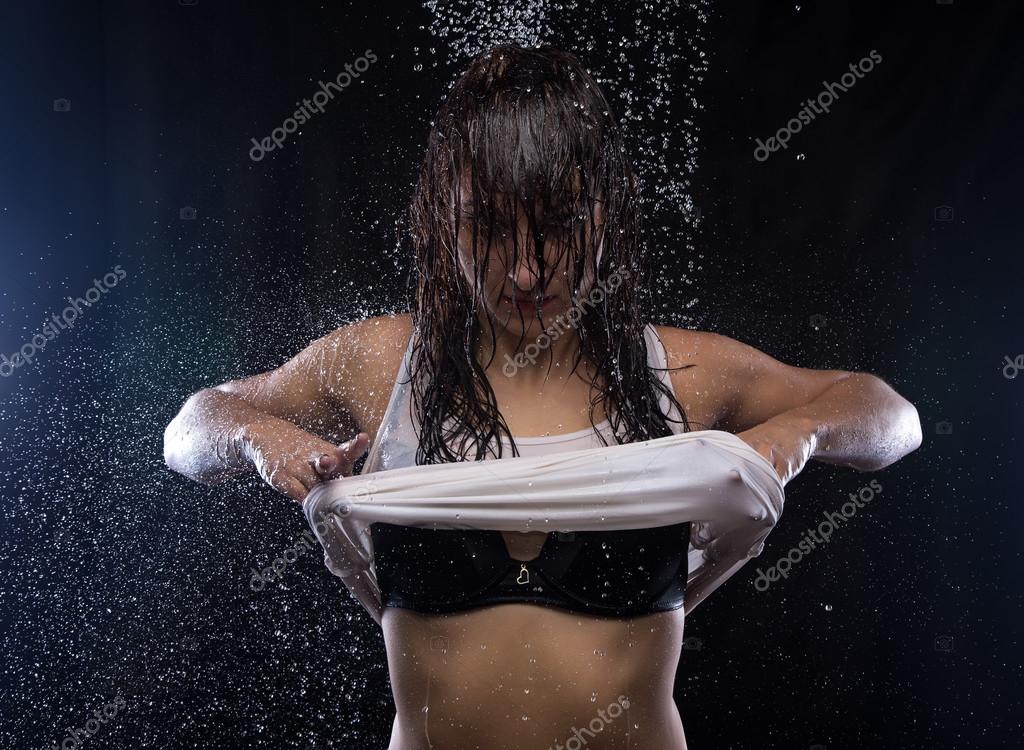 Sexy woman in black bra holding white t-shirt Stock Photo by ©ChrisTefme  88868842