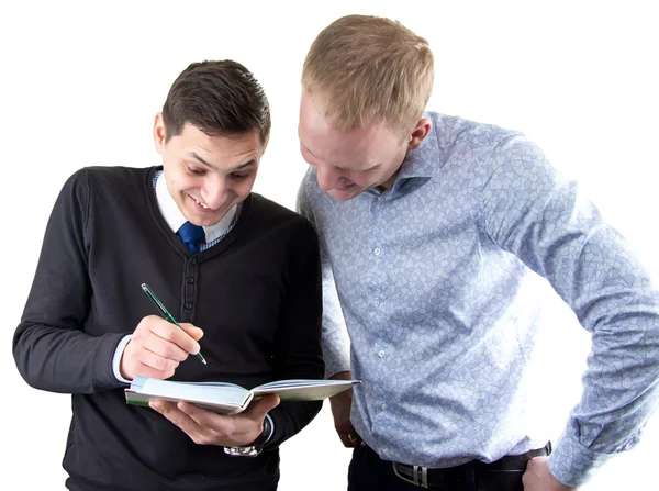 Dwie businessmans na biały patrząc w książce — Zdjęcie stockowe