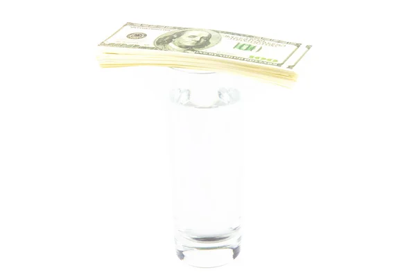 Glass water and bundle of dollars — Stock Photo, Image
