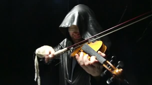 Blind man playing on a fiddle — Stock Video