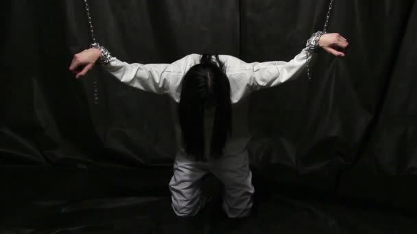 Crucified man with long hair — Stock Video