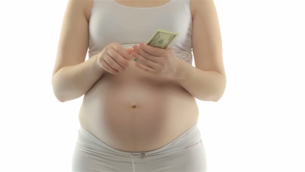 Pregnant woman counting dollars — Stock Video