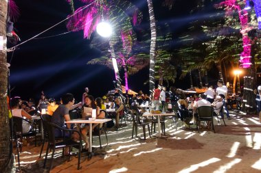 BORACAY, PHILIPPINES - 12 FEBRUARY 2016: multiracial tourists chilling at beach restaurant bar in Boracay - Travel concept with people travelers from all over the world