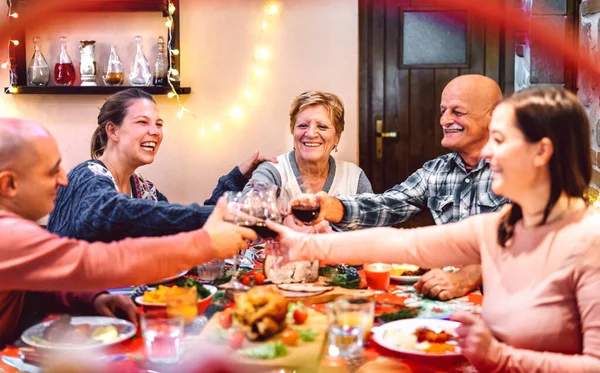 People Toasting Red Wine Having Fun Winter Holidays Reunion Dinner — Stock Photo, Image