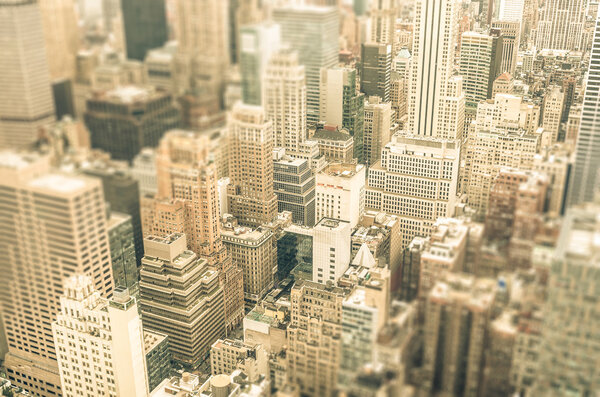Skyscrapers in the business district of New York City - Aerial view of modern buildings of the skyline in downtown Manhattan - Tilted shift defocusing
