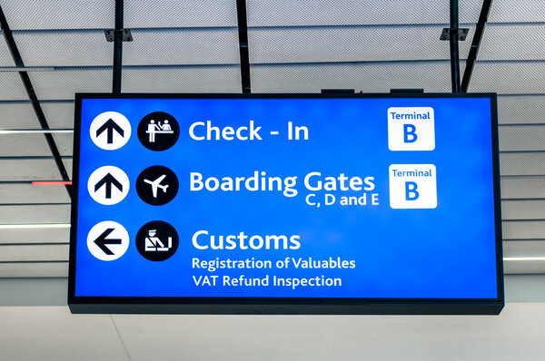 Info sign at international airport - Directions for check in and boarding gates - Registrations and custom at terminal connections