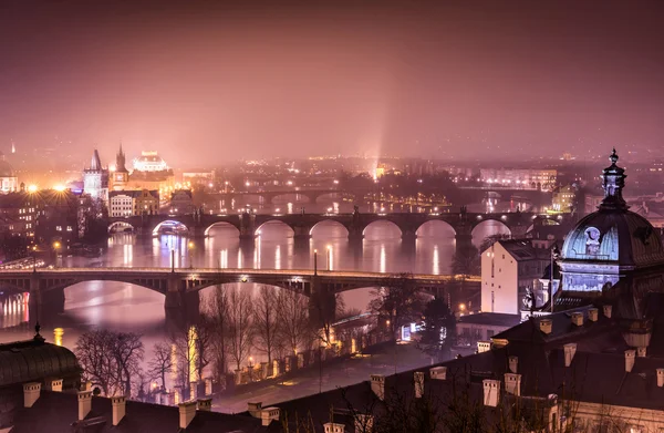 Prague and Vltava river from Letna Hill - Romantic view after misty sunset with emotional marsala color filter - European capital of bohemian Czech Republic — Stock Photo, Image