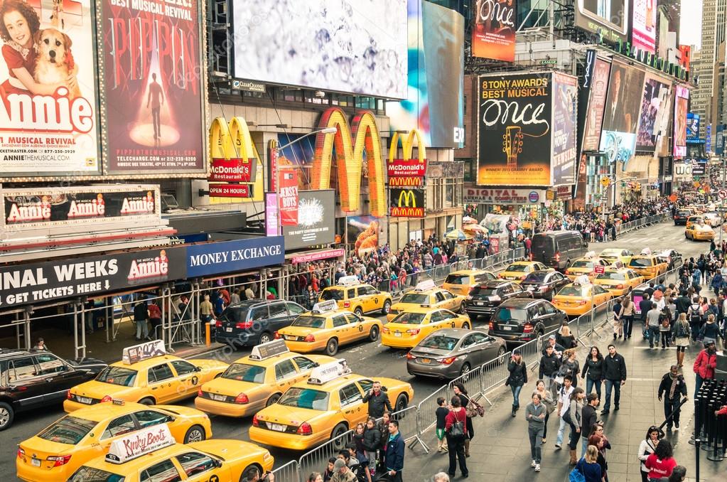 NEW YORK - DECEMBER 22, 2014: taxicabs and traffic jam congestion in front of Mc Donalds in Times Square in Manhattan, New York. Times Square is one of the world's most visited tourist attractions.