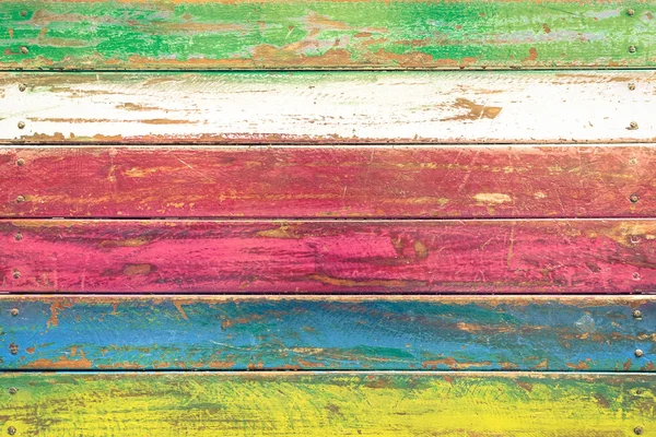 Fond en bois multicolore et matériau de construction alternatif - Texture sur table en bois dans le restaurant de mode altérative - Modèle de toile de fond sans couture rétro - look filtré désaturé vintage doux — Photo