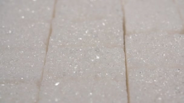 Sugar lumpy close-up. White sugar. Sugar cubes. — Stock Video