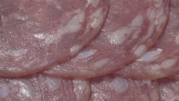 Sausage salami close-up. Slices of sausage. — Stock Video