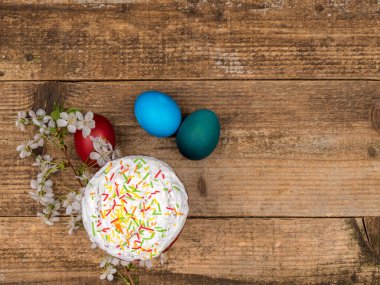 Spring Easter still life on a wooden background.