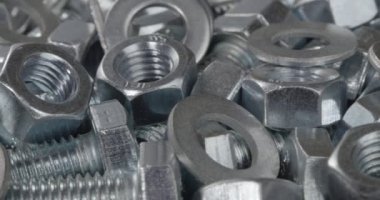 Cıvatalar, çamaşır makineleri ve fındıklar yakın plan. Fasteners.