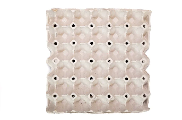 An egg carton on a white background — Stock Photo, Image