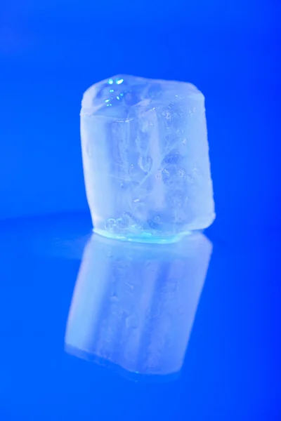 Wet ice cubes on blue background — Stock Photo, Image