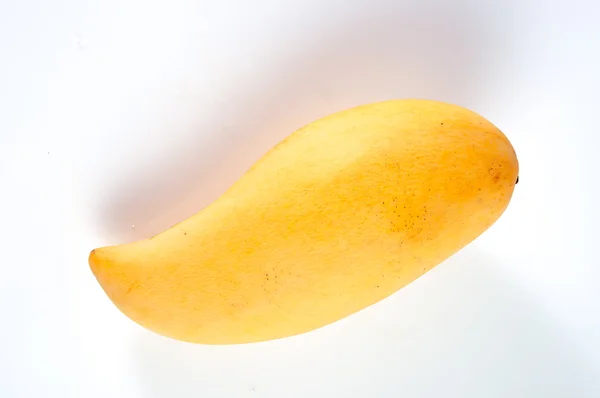 Mogen mango på vit bakgrund Stockbild