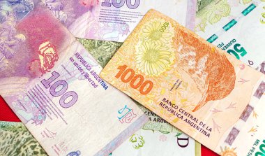 Peso banknotes of the money of the argetine currency, the Argentine peso. Close up photo. Economy and finance concept.