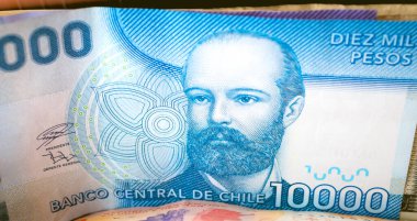Chilean Peso (CLP) banknotes, currency of Chile close up.