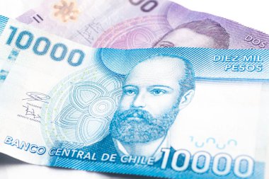 Chilean Peso (CLP) banknotes, currency of Chile close up.