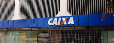 Brasilia, Federal District - Brazil. January, 01, 2023.The Federal savings bank logo CAIXA on the building in the city of Brasilia. 