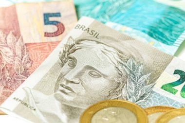 Real, money from Brazil. Dinheiro, Reais, Real Brasileiro, Brasil. Brazilian banknotes in close-up.   