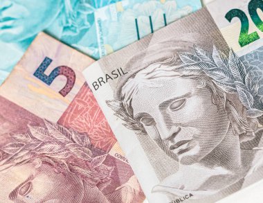 Real, money from Brazil. Dinheiro, Reais, Real Brasileiro, Brasil. Brazilian banknotes in close-up.   