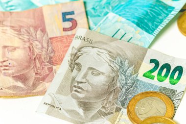 Real, money from Brazil. Dinheiro, Reais, Real Brasileiro, Brasil. Brazilian banknotes in close-up.   