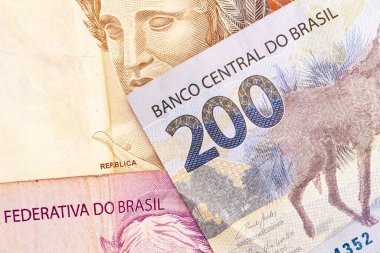 Real, money from Brazil. Dinheiro, Reais, Real Brasileiro, Brasil. Brazilian banknotes in close-up. A brazilian banknote of 200 Reais  
